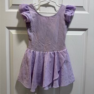Purple dance leotard with attached skirt
